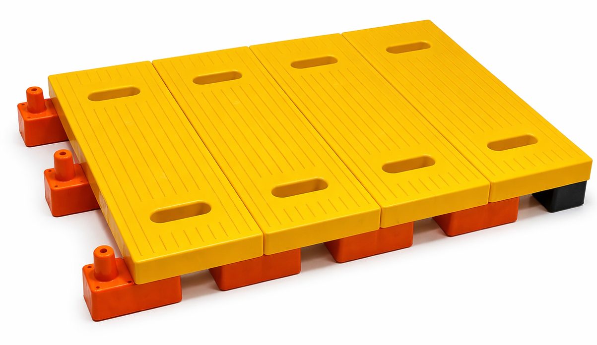 A four-board StrikeMatz deck supported on orange and black HDPE feet